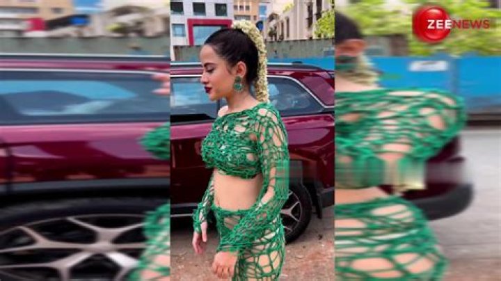 
Another appearance by Urfi Javed without a top! wearing a nosepin and a green Wired dress 